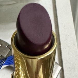 Insulent plum lipstick
